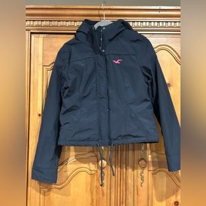 Hollister Winter Jacket with Hood. Size Medium. Black with Pink Lining Like New!